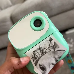 【tiktokshopbacktoschool】Kids Instant Print Camera (with 3 Rolls of Paper), 2.4" LCD Screen, Rechargeable 1080P Pocket Camera, 12MP Photos, Thermal Paper Printing (No Ink Needed), Birthday Gift for Boys & Girls, Portable Lens Camera