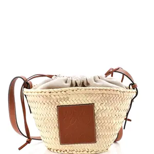 Pre-owned Loewe material Messenger Bags Drawstring Bucket Crossbody Bag Raffia and Leather by Rebag
