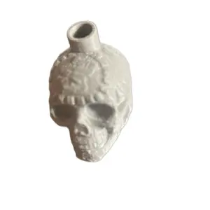 Aztec death whistle skull keychain