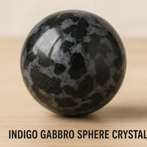 Indigo Gabbro Crystal Sphere . This crystal purpose is for manifestation and intuition .Gabbro will help guide you through life changes & stay grounded