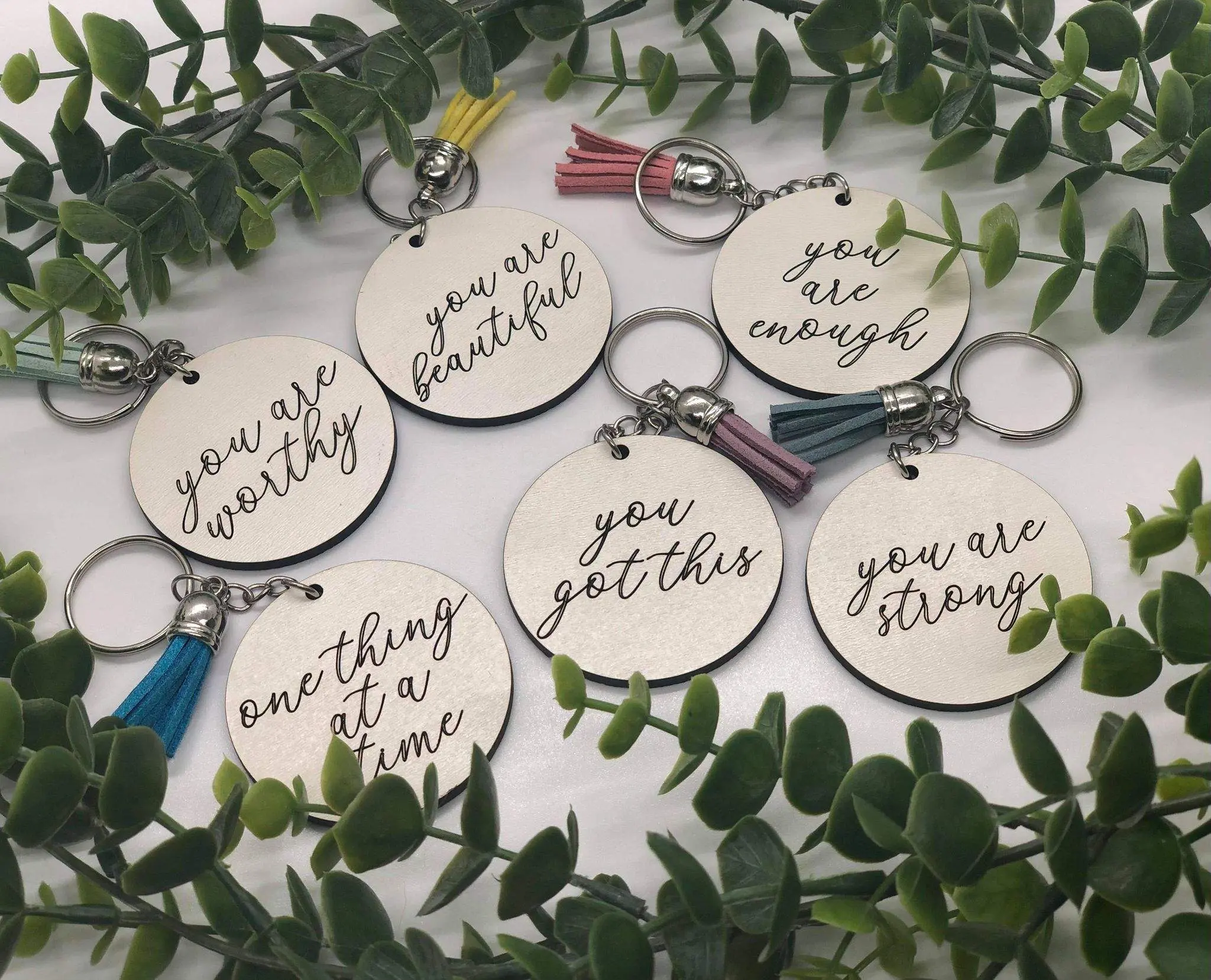Engraved Inspirational Keychain on White Hardwood with Brown Back and Random Tassel Color