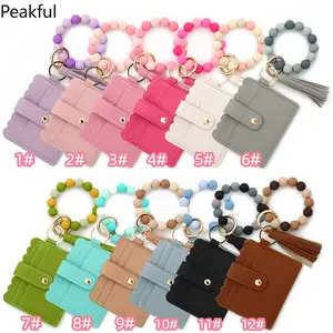2026 Silicone Bead Bracelet Solid Leather Card Bag Wristlet Keychain Silicone Beaded Bracelet Leather Tassel Wallet Bangle