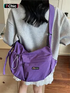 Japanese ins simple and lightweight purple and orange dumpling bag, leisure travel fitness crossbody bag, college students' fashionable commuting versatile shoulder bag, zipper closure, multiple colors optional, suitable for students, office workers commu