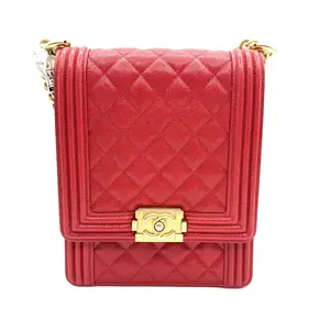 Pre-owned CHANEL Leather Shoulder Bags red North/South Boy Flap shoulder bag in quilted caviar with aged gold tone hardware.