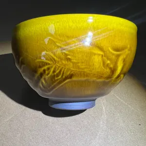 Yellow carved dragon and phoenix large caliber tea cup