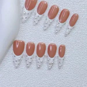 10 Pieces Medium Length White French Tips with Pearl Press On Nails for Quick Easy Nail Art Transformation