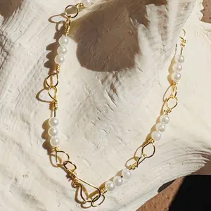 Gold Wire Wrapped Pearl Bracelet with Elegant Heart Links and White Pearls
