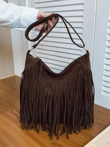 Large capacity solid color tassel versatile shoulder bag, simple retro bohemian style crossbody bag, niche design casual texture bucket bag, Fashionable bohemian bag, suitable for commuting to work, daily outings