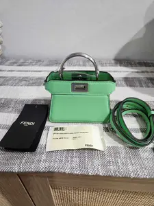 Pre-owned FENDI Leather mini bags Micro Peekaboo Shoulder Bag with detachable strap New with tags, protective sticker intact