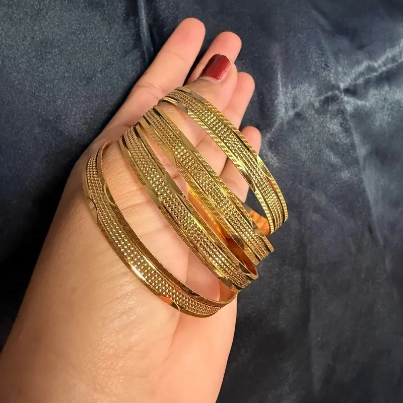 Gold Bangle Set for Women, 4-Piece Elegant Fashion Jewelry with Geometric, Twisted, and Textured Designs, Stackable for Party, Female, Metal Coating