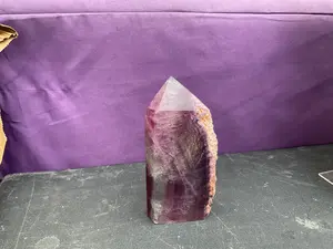 Natural Purple Fluorite point with raw edge
