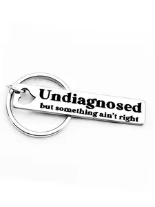 1pc Funny Men's Keychain, "Undiagnosed but Something Ain't Right" Stainless Steel Keychain, Creative Hollow Heart Design, Humorous Gift for Family & Friends, Ideal for Birthdays & Parties, Festive Accessory, Playful Quote, Durable Keychain