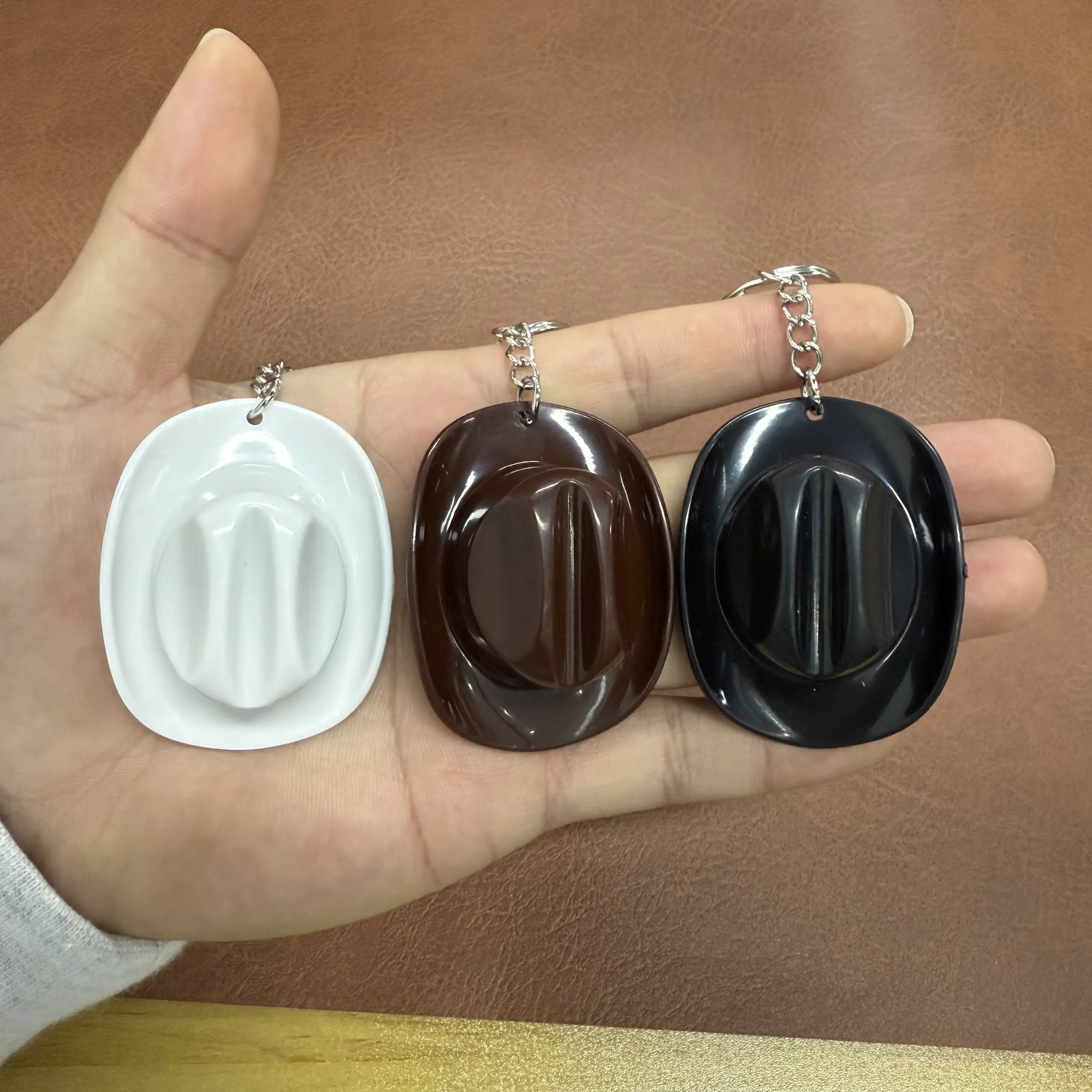 Cowboy Hat Texas Style Bottle Opener Keychain, available in three colors to create your personalized style.