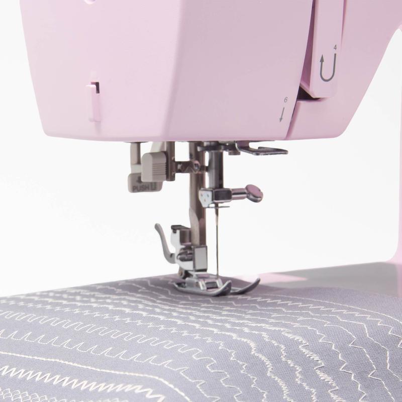 SINGER® Heavy Duty 4452 Rosewater Pink Sewing Machine & Extension Table Bundle