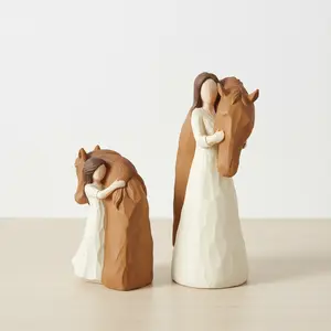 Cute Girl Hugging a Horse Resin Figurine - A beautiful home decor item, perfect for display on tabletops in the living room, study, or bedroom.  An artistic gift for animal lovers, ideal as a desk or bookshelf decoration, and a charming horse-themed gift.