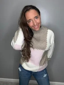 Hanging on by a thread patchwork sweater