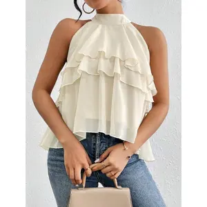 Women’s loose-fit chiffon shirt with an asymmetrical design and ruffled edges — a casual sleeveless top with ruffle detailing and button details, suitable for everyday wear, available in black.