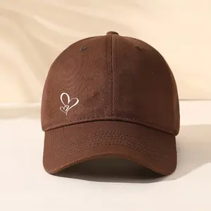 A cute baseball cap with a heart-shaped pattern