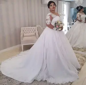 Long sleeved Laced wedding gown