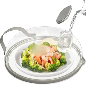 Multi-Functional 10-Inch Microwave Splatter Cover and Food Steamer: Innovative Splash Guard with Integrated Water Reservoir for Healthier Steamed Meals, Easy-Grip Handle, and Universal Plate Compatibility