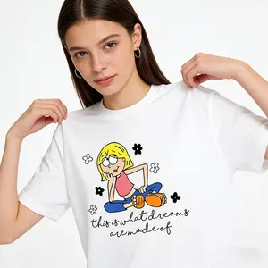 This is a Black and white T-shirt printed with the lyrics "this is what dreams are made of," a short-sleeved top featuring an inspirational quote.