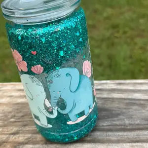 Snow Globe Tumbled with Glittering Teal Color and Elephant Design Accessories