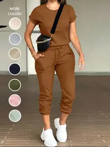 Women’s two-piece set featuring a basic solid-color short-sleeve fitted tee with a casual round neckline and drawstring-waist pants with pockets—ideal for daily wear; ladies’ clothing suitable for all seasons.