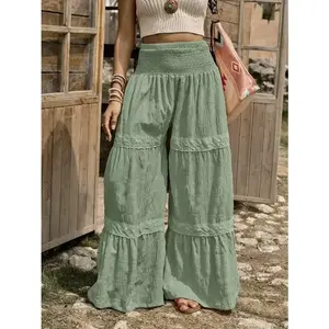 Women’s wide-leg pants inspired by Western country style, featuring textured fabric and ruffle trim