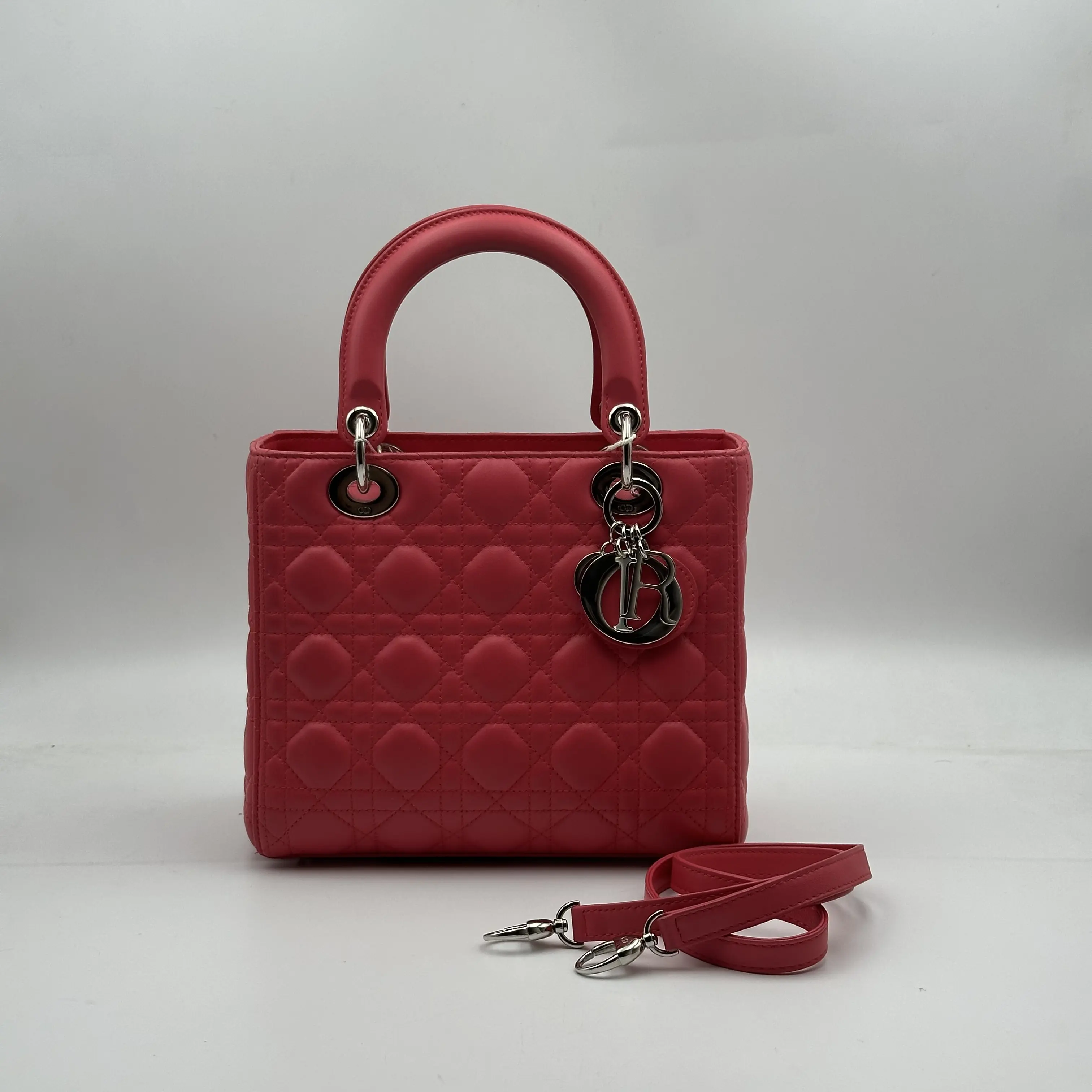 Pre-owned Dior H5 handbag in rose pink with pink accents, silver clasp, five compartments, Princess Diana style, model H02274