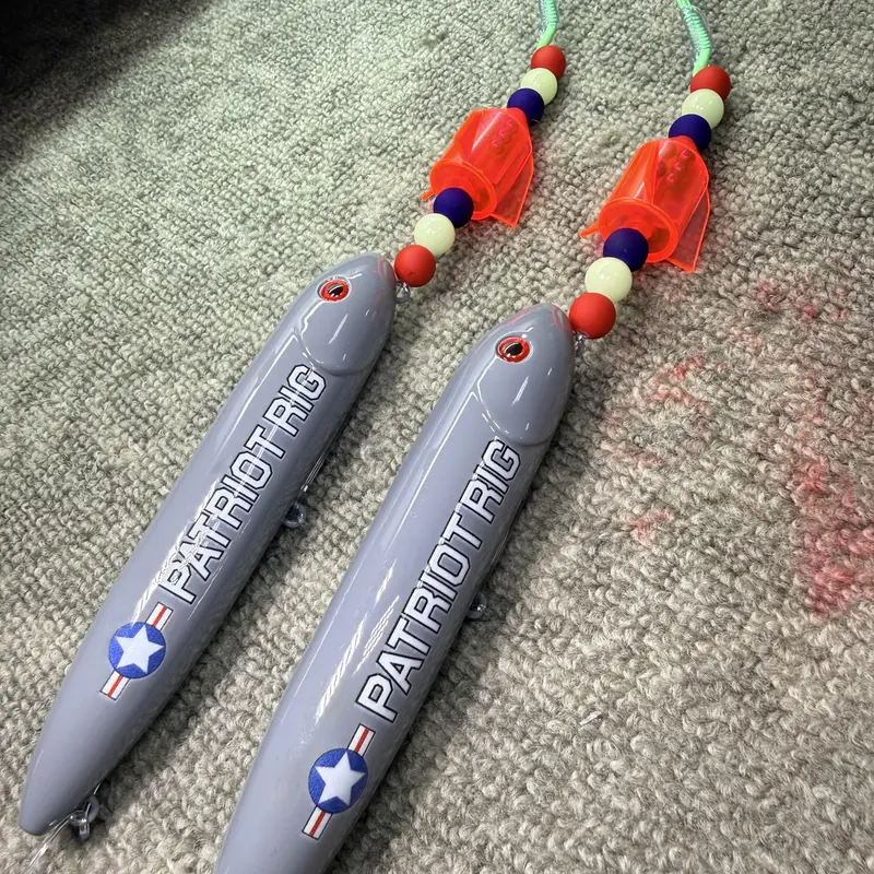 Patriot Rigs (13cm) 2 Pack: Pre-Tied on 10/0 green glow hooks, rocket rattle, and 100 pound smoke blue mono leader line