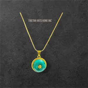 Turquoise pendant with gold plated chain