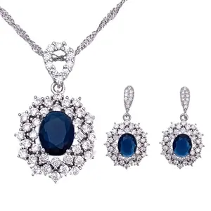 Elegant Sapphires and Zirconia Pendant Necklace and Earrings Set