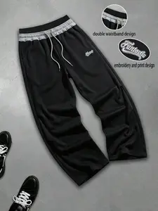 Unisex oversized Y2K street casual athletic pants. Men’s faux two-piece jogger sweatpants with dual belts and embroidered logo, featuring an elastic waistband and drawstring design—perfect for streetwear and weekend activities, suitable for various venues