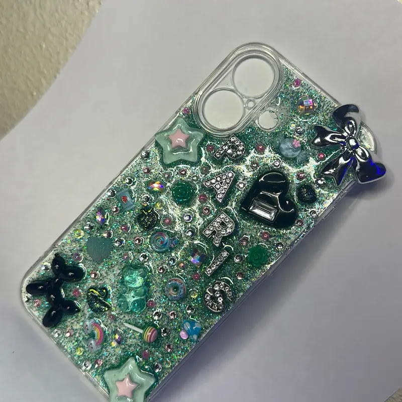 iPhone 16 Junk Case with Glittery Green Design and Decorative Charms for Stylish Protection