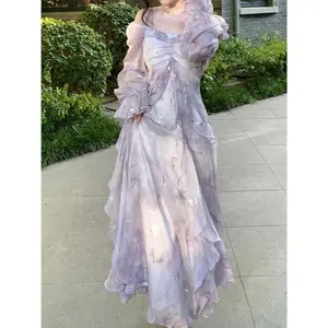 Elegant pleated long-sleeve dress for early autumn with a butterfly design, gold foil accents, and a pure fairy aesthetic, featuring a gradient from gray to blue.