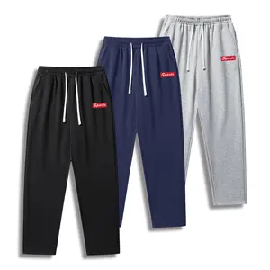 Men's solid color printed casual pants with an adjustable drawstring waistband, stylish and casual, comfortable and versatile, loose fit, suitable for all seasons, street style, sporty style, fashionable blended fabric, men's autumn outfit combinations.