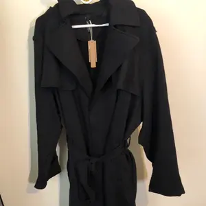 TRENCH COAT BOYFRIEND FLEECE SIZE M onyx black. New with tags. Retails for $348. Deal you can’t resist. Heavy material great for cold weather.