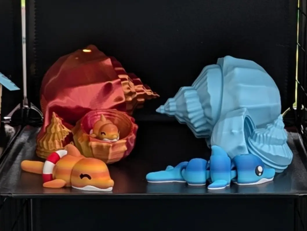 3D Printed Flexi Dolphin in Seashell Container | Twist Open | Orange or Blue | Mini or Medium