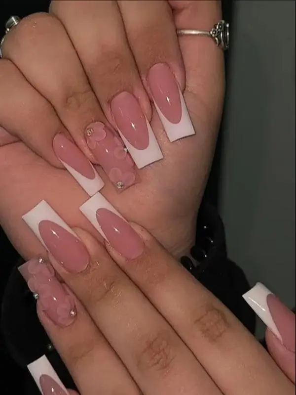 Elegant French Tip Coffin Nails with 3D Floral Accents and Rhinestones