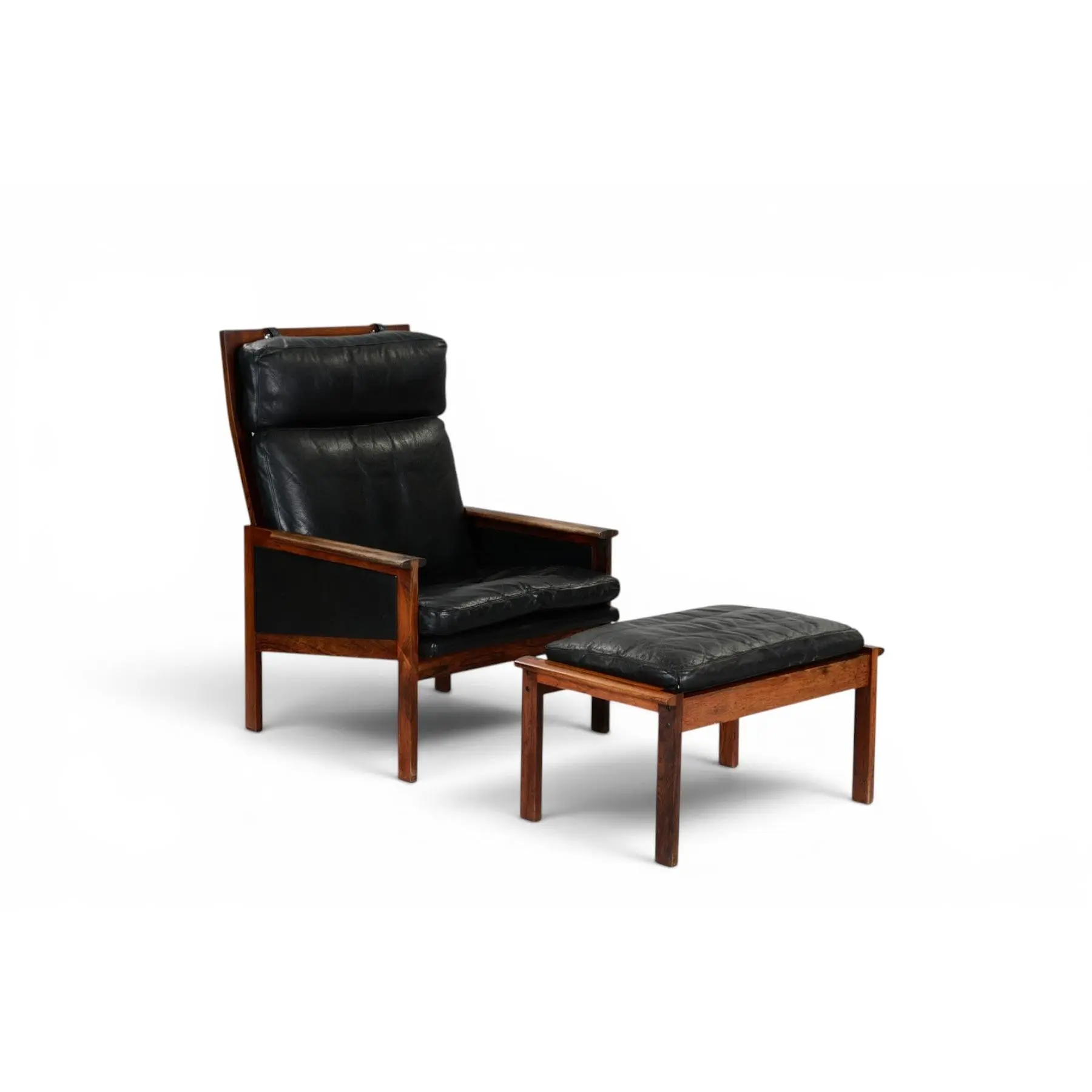 ILLUM WIKKELSØ "CAPELLA" ROSEWOOD ARMCHAIR WITH FOOTSTOOL, BLACK LEATHER