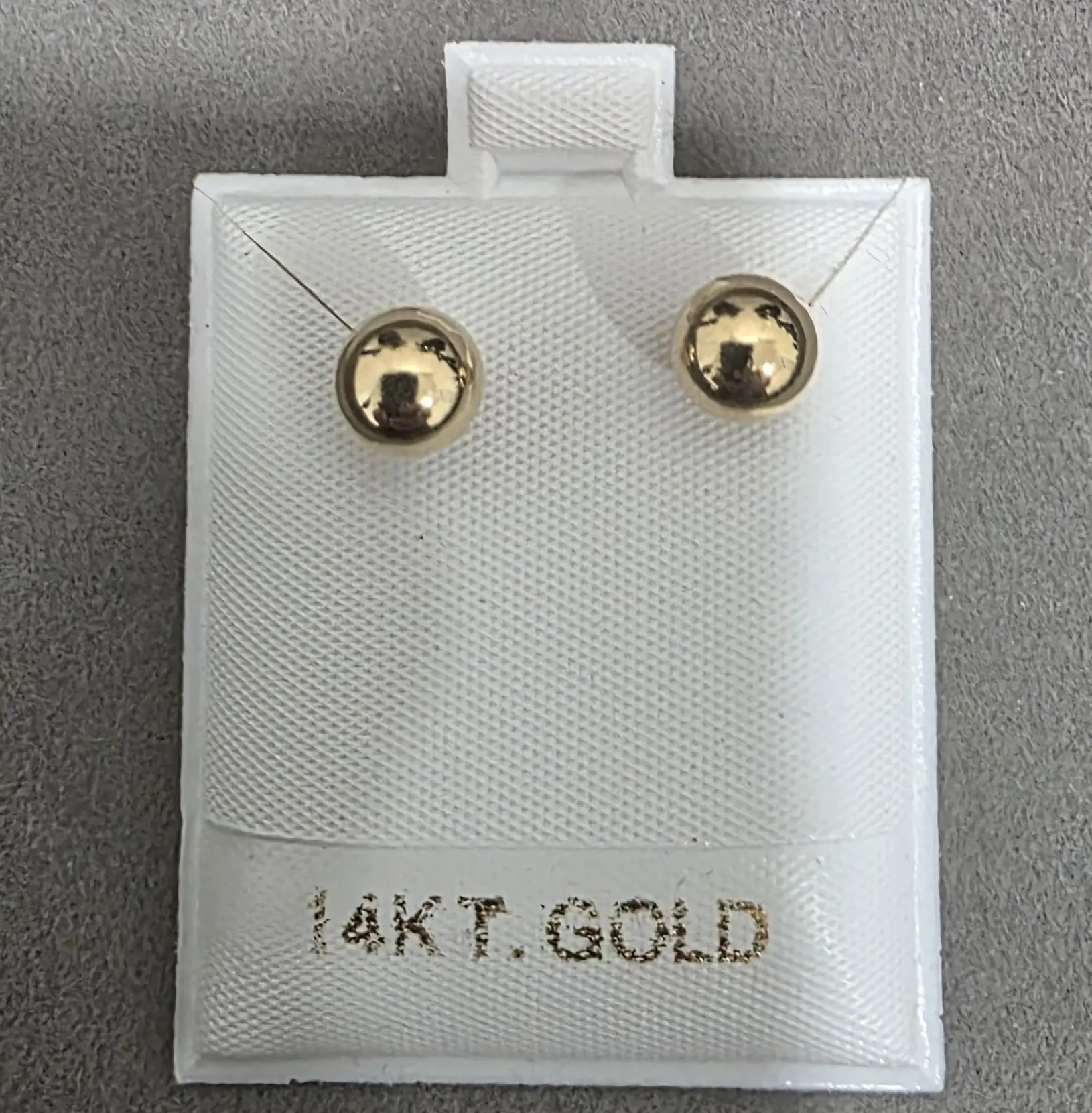 14k, 7 mm.  Plain gold ball earrings