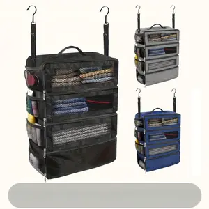 Multi layer hanging clothing storage bag with hooks, foldable luggage organizer bag, equipped with 4 compartments, suitable for travel and family use