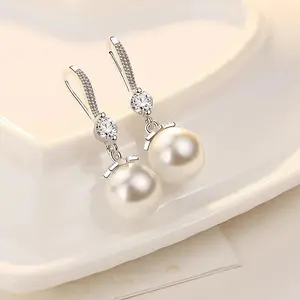Elegant Pearl Drop Earrings – with Sparkling CZ Hook & Bow Accent, Large White Shell Pearl, Classic Bridal Jewelry for Women