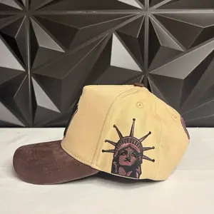 Brown and beige New York hat