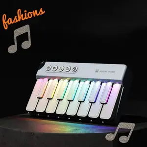 Mini Electronic Pocket Piano, Portable Handheld Keyboard, Digital Piano, No External Power Needed, Multi-Color, Cool Lights, Parent-Child Interaction Toy