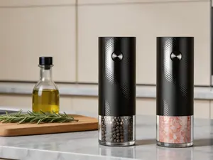 Rechargeable automatic seasoning grinder set with adjustable coarseness settings. Designed with a large capacity container for daily cooking, this practical kitchen appliance comes in a two-piece set and works well as a household gift.