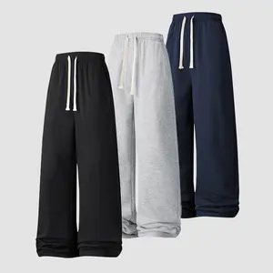 Men’s solid-color fleece-lined drawstring casual pants with a relaxed fit for all seasons—loose and comfortable for everyday wear. Wide-leg design with an elastic drawstring, suitable for daily life, holidays, and workouts.