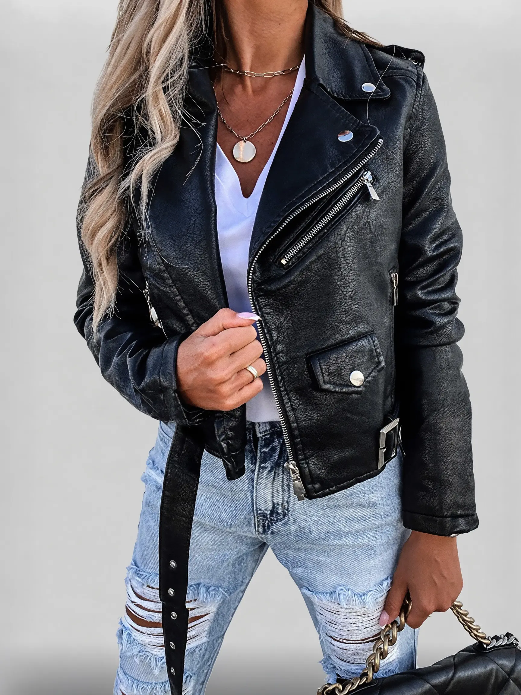 Women’s jacket/outerwear, full-zip long-sleeve motorcycle leather top, suitable for casual and formal wear, turn-down collar with a slant zipper design, classic motorcycle-style cut.