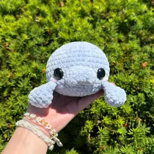 Hand-crocheted blue manatee