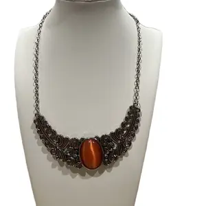 Silver Crescent Shaped Moonstone with Orange Accents